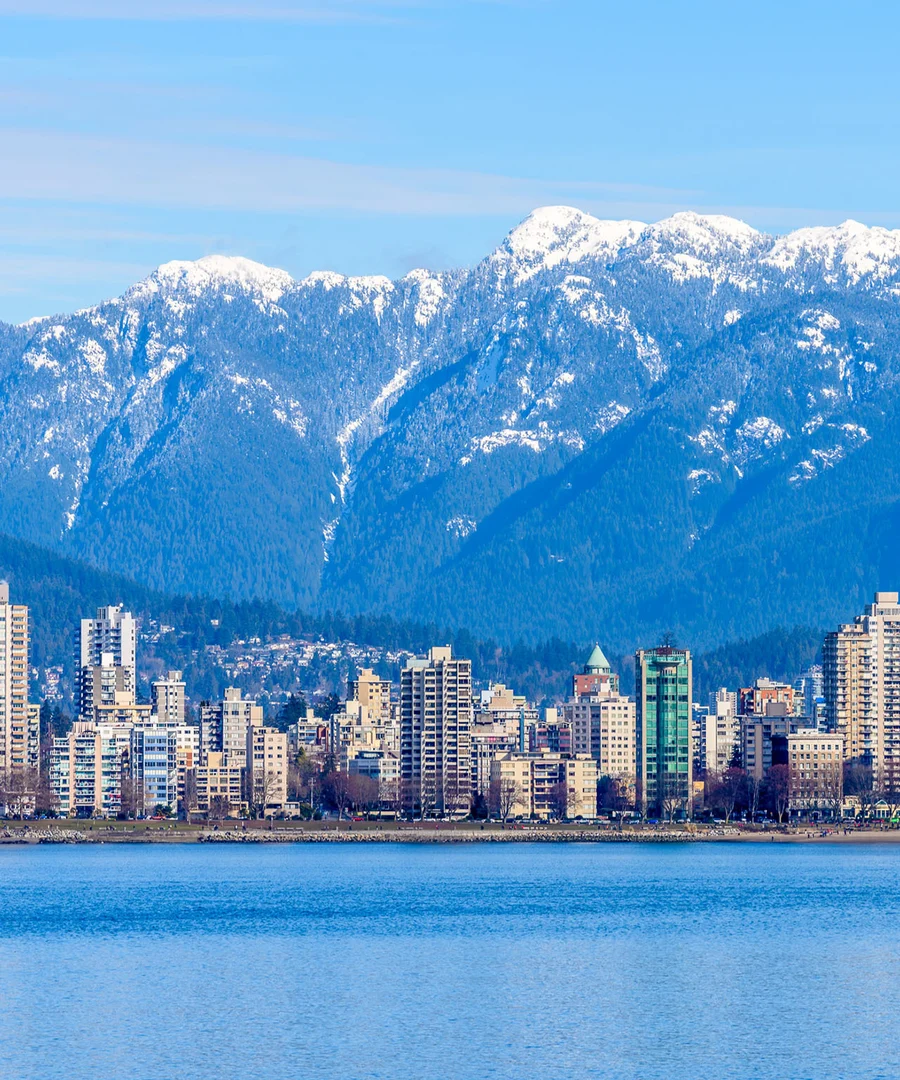 Vancouver skyline with mountains behind the city